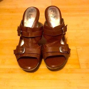 Cute small heeled brown leather shoes